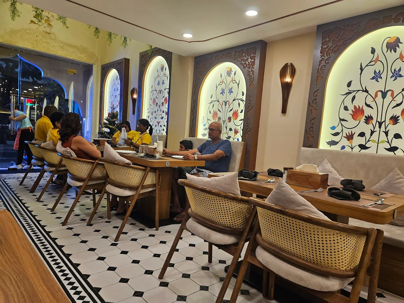 Tanishq features a traditional Indian setting that exudes warmth and friendliness for every guest